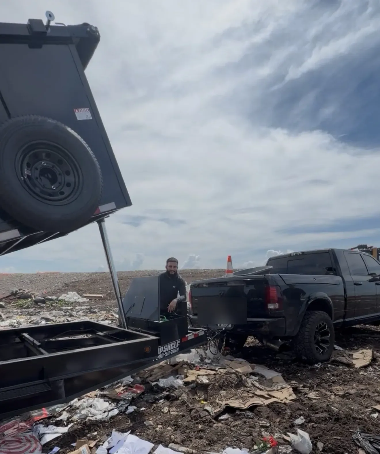 Superior Demo dump trailer unloading demolition debris at the disposal site in South Florida