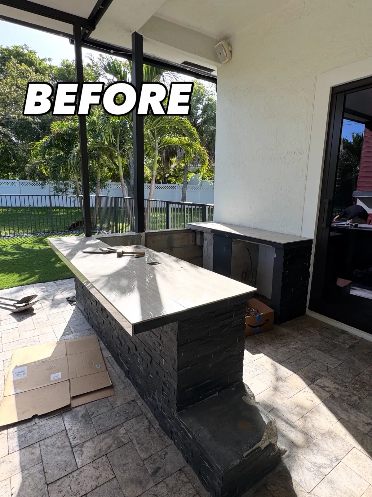 Outdoor patio kitchen and bar before demolition by Superior Demo & Debris Removal in Broward County FL